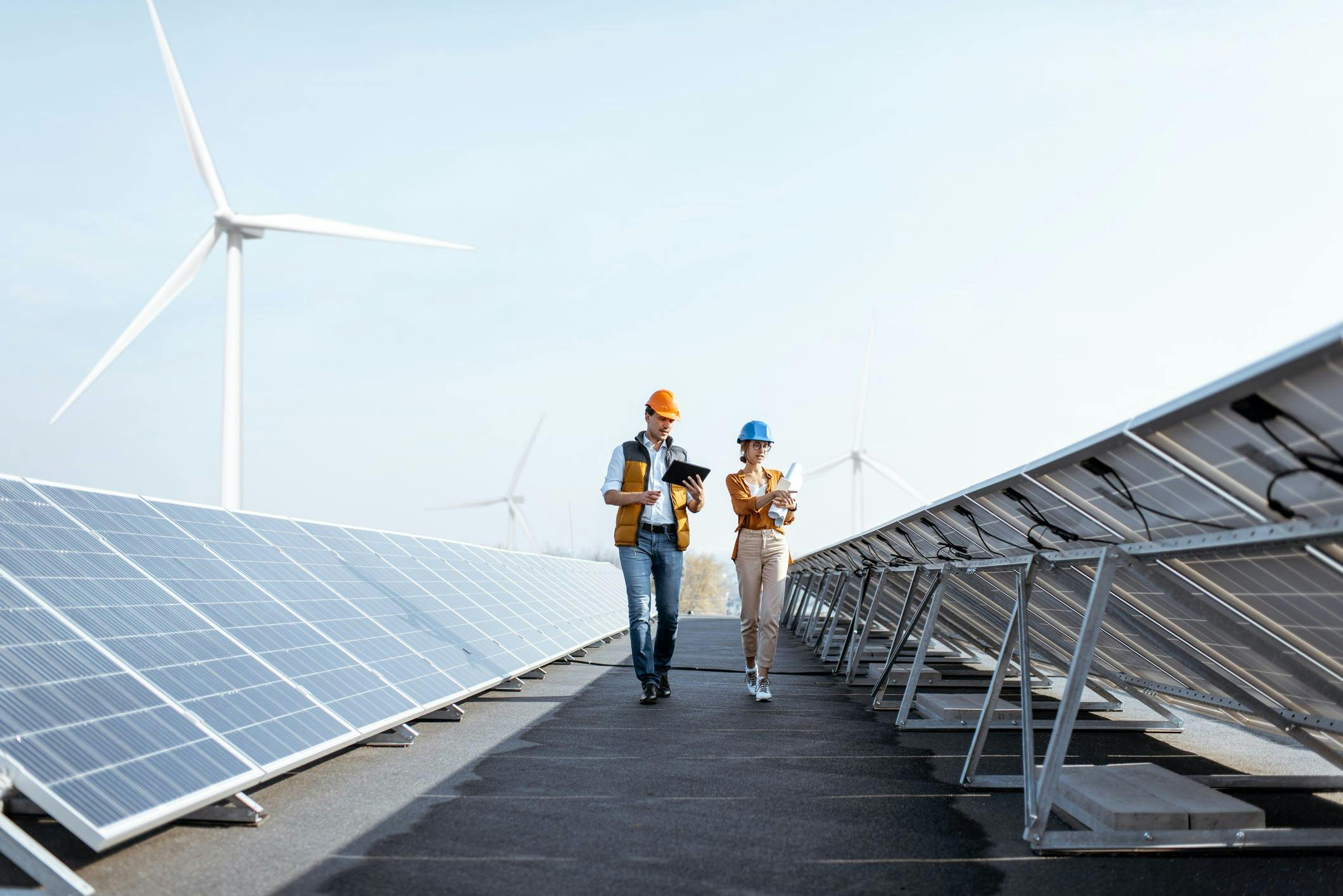 Man & Woman Hard Hats Solar Power